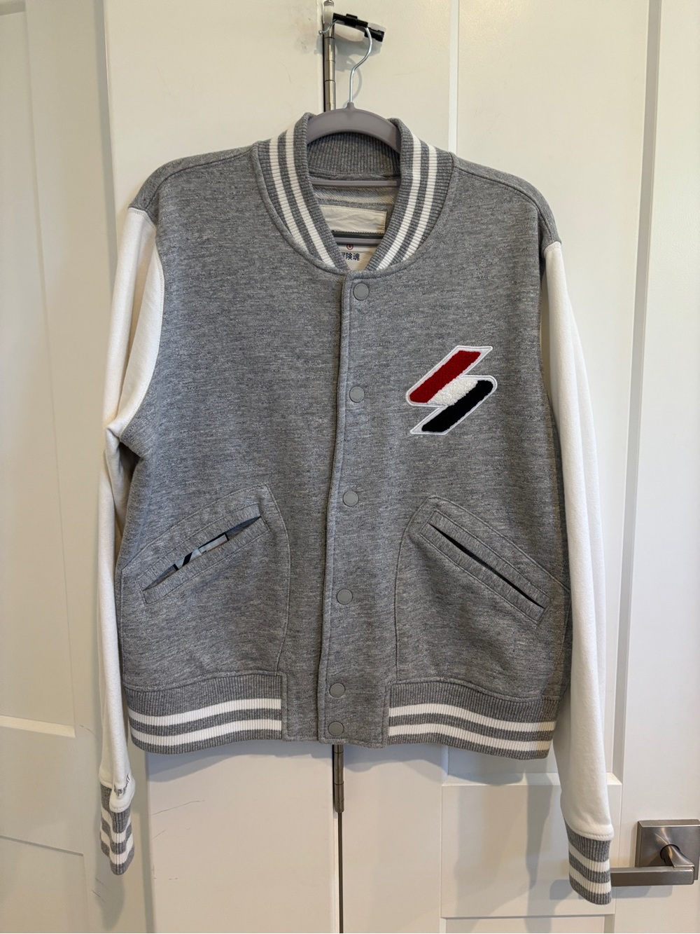 Superdry Women’s Grey and White Cotton Varsity Style Jacket. Size L/Xl